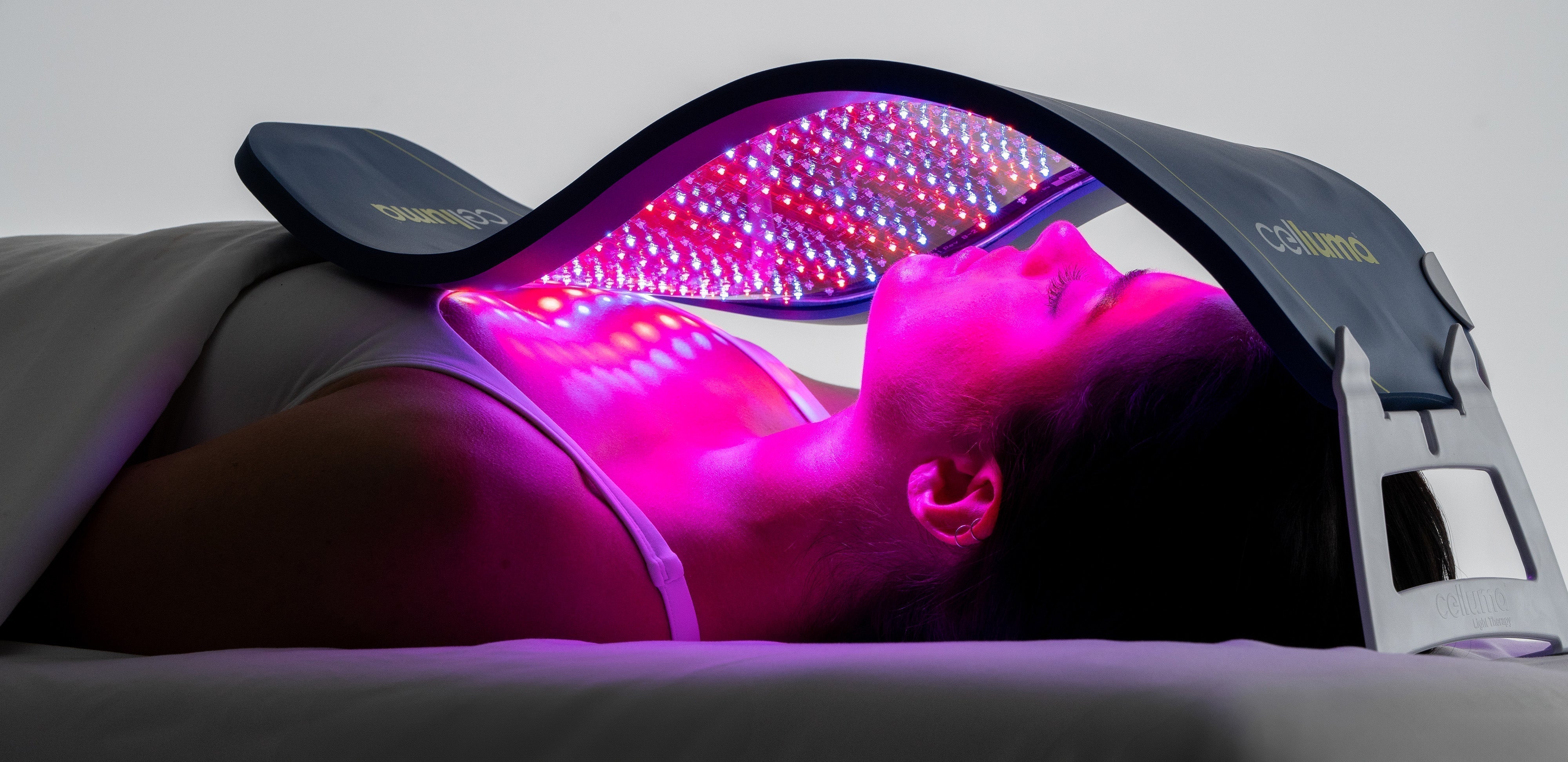 Woman using the new Celluma PRO PLUS