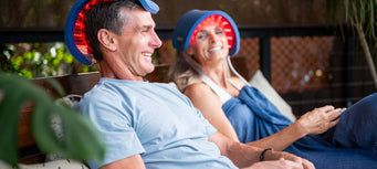 A couple in the UK using red light therapy to stimulate hair growth at home